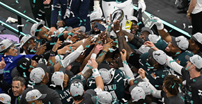 Super Bowl LIX Champs - Philadelphia Eagles players celebrate with the Vince Lombardi Trophy at the end of Super Bowl LIX, after the Philadelphia Eagles defeated the Kansas City Chiefs 40-22 at Caesars Superdome in New Orleans, Louisiana, February 9, 2025. (Photo by Chandan Khanna / AFP)