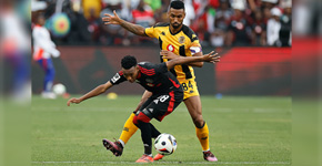 Pirates v Chiefs - Pirates' South African forward #38 Relebohile Mofokeng (L) fights for the ball with Chiefs' Portugues defender #84 Inacio Miguel (R) during the Premier Soccer League (PSL) South African Premier Division football match between Orlando Pirates and Kaizer Chiefs at the FNB Stadium in Johannesburg on February 1, 2025. (Photo by Phill Magakoe / AFP)